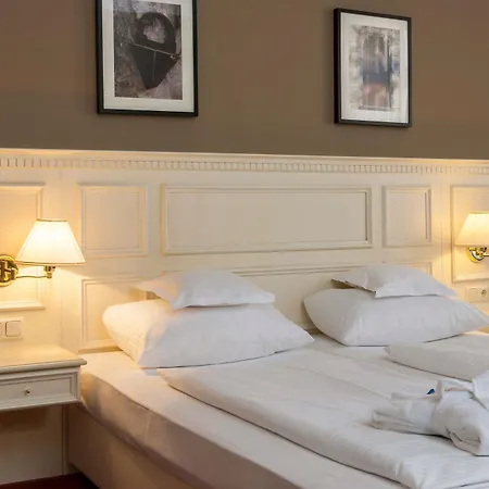 Отель Wyndham Garden Stadtschloss 4*